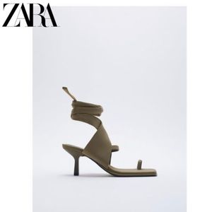 HEELED SANDALS WITH TIED STRAP